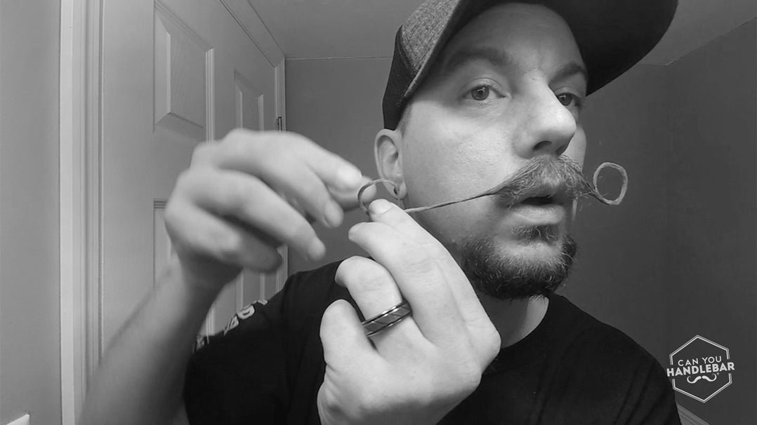 How long should your handlebar moustache be