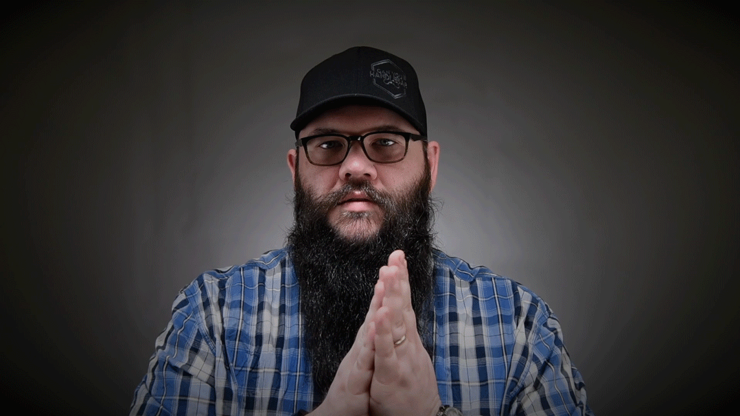 Warm the beard balm by rubbing your hands together, then massage into your beard