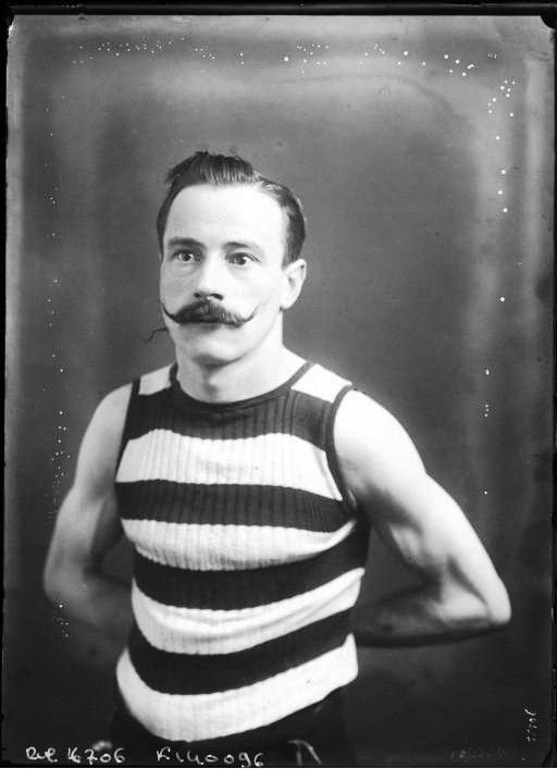 Old school guy with handlebar (who didn't trim)