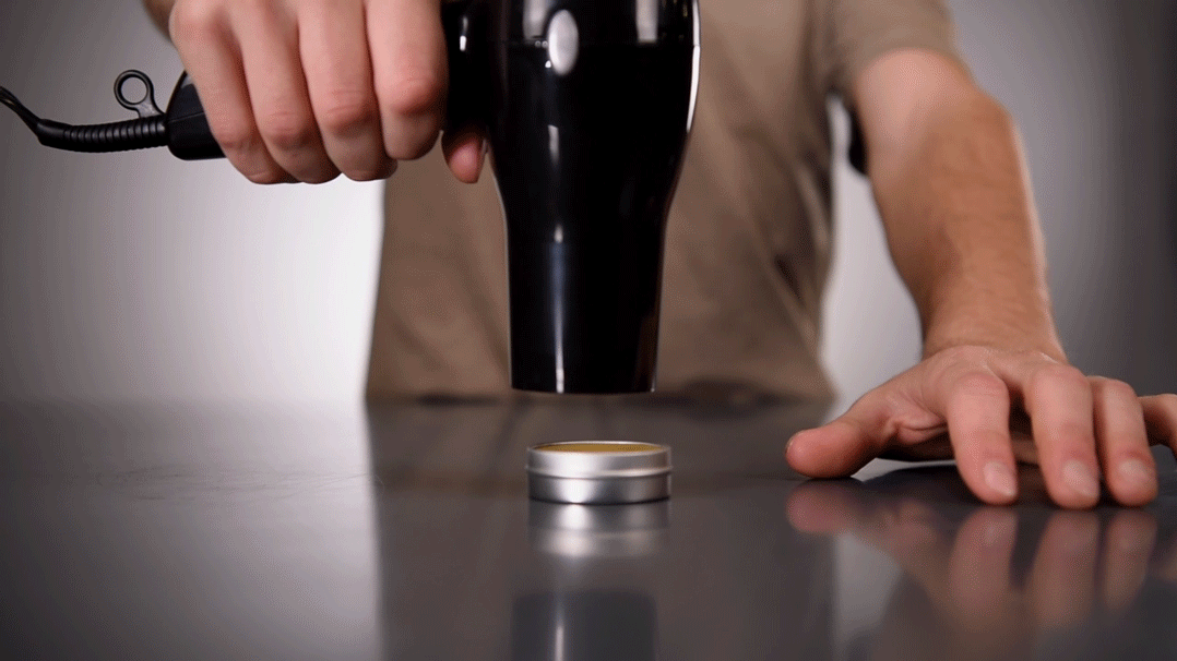 warm your moustache wax using a hair dryer on its lowest setting
