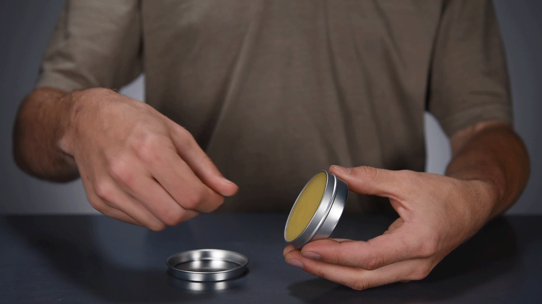 Scoop beard balm with your thumbnail to apply by hand