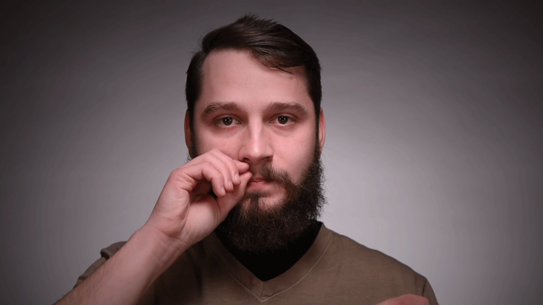 Apply soft wax to moustache from the middle outward